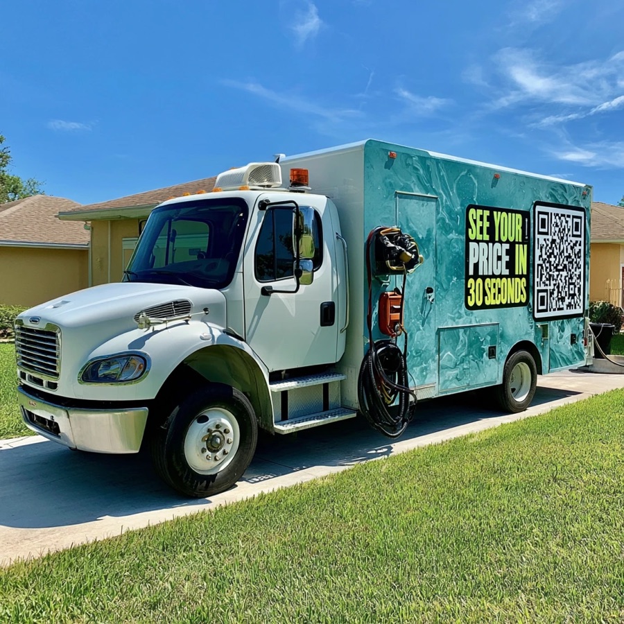 Work truck wrapped with a 'See your price in 30 seconds' QR code